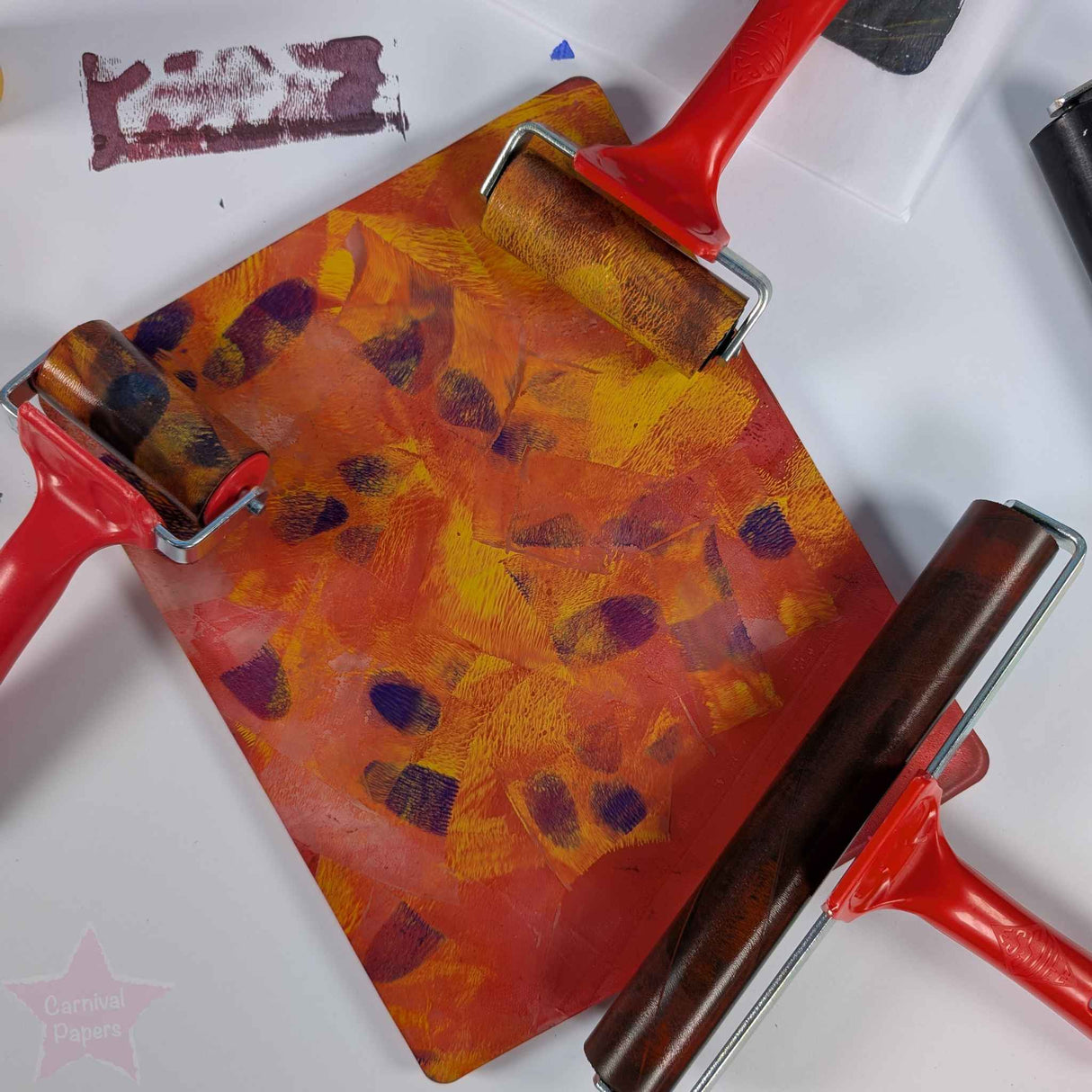 Brayer Roller on Gelli Plate surface on a white background