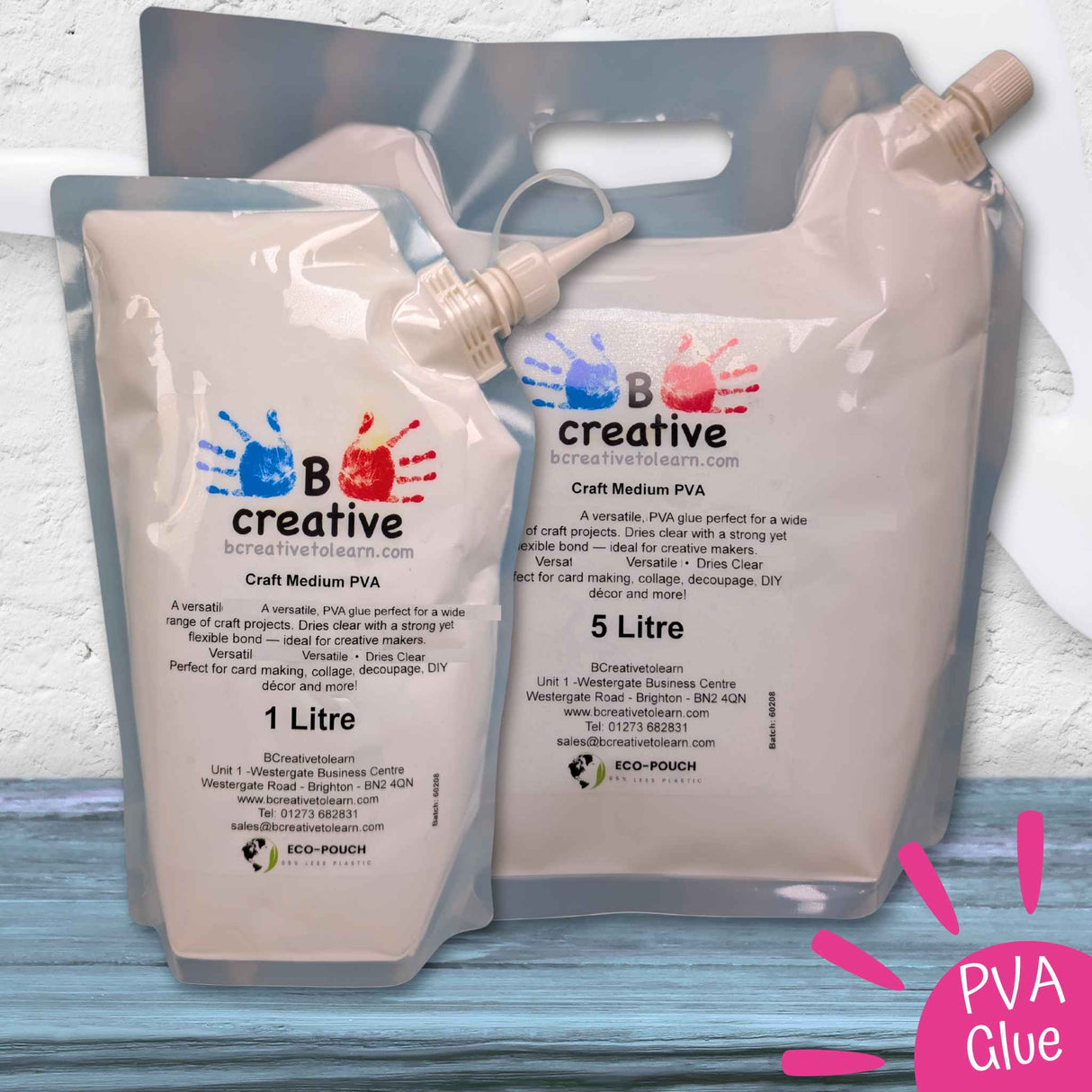 Two large plastic bags of B Creative PVA glue on a wooden surface with a white background.