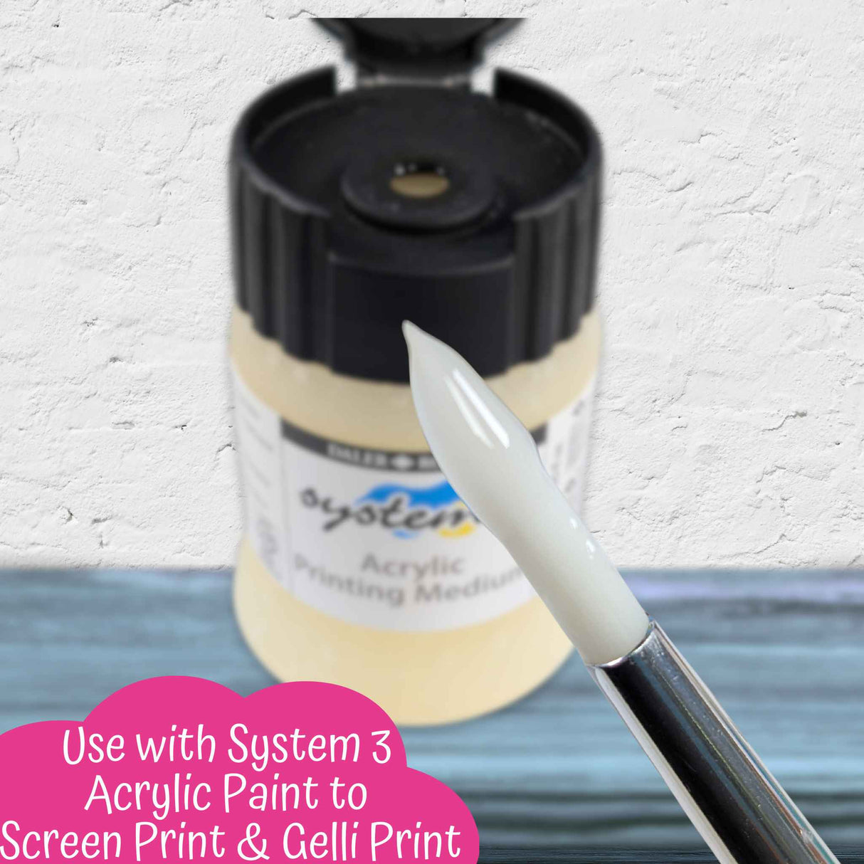 Close-up of brush coated with System 3 Acrylic Printing Medium ready for mixing with acrylic paint for gelli printing.