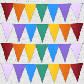 A series of triangular flags in various colors strung together on a length of jute string, displayed against a white background.